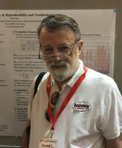 Dr. David Wells in front of an ASEE Conference poster presentation